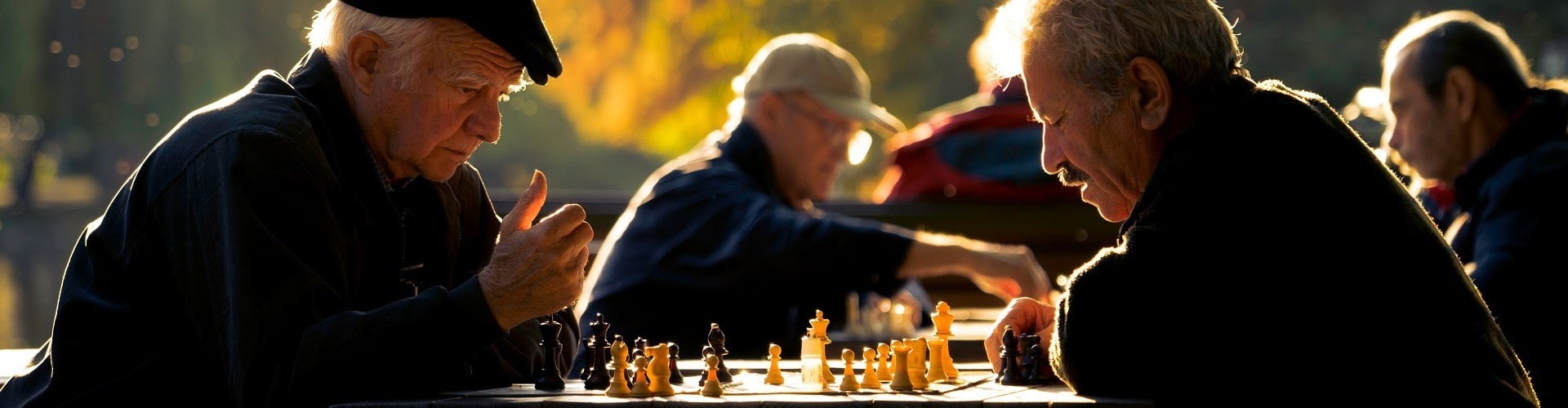 senior men playing chess